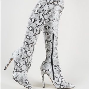 Over the knee snake print boots